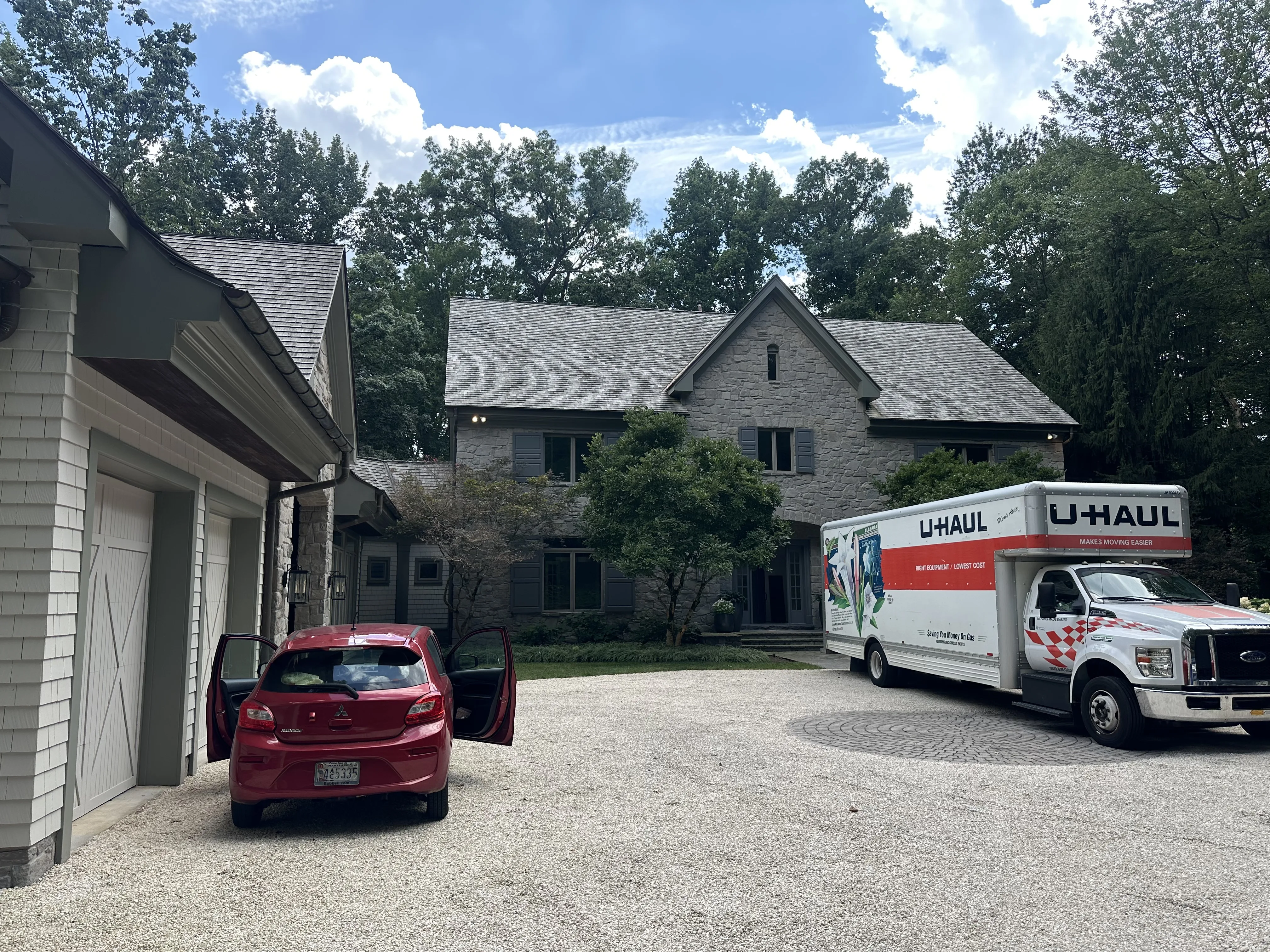 U-Haul truck parked at estate on a sunny day
