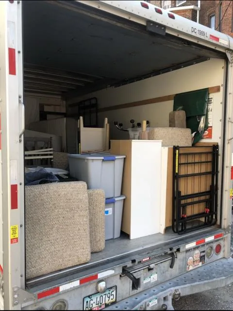Fully loaded truck — furniture and boxes wall to wall